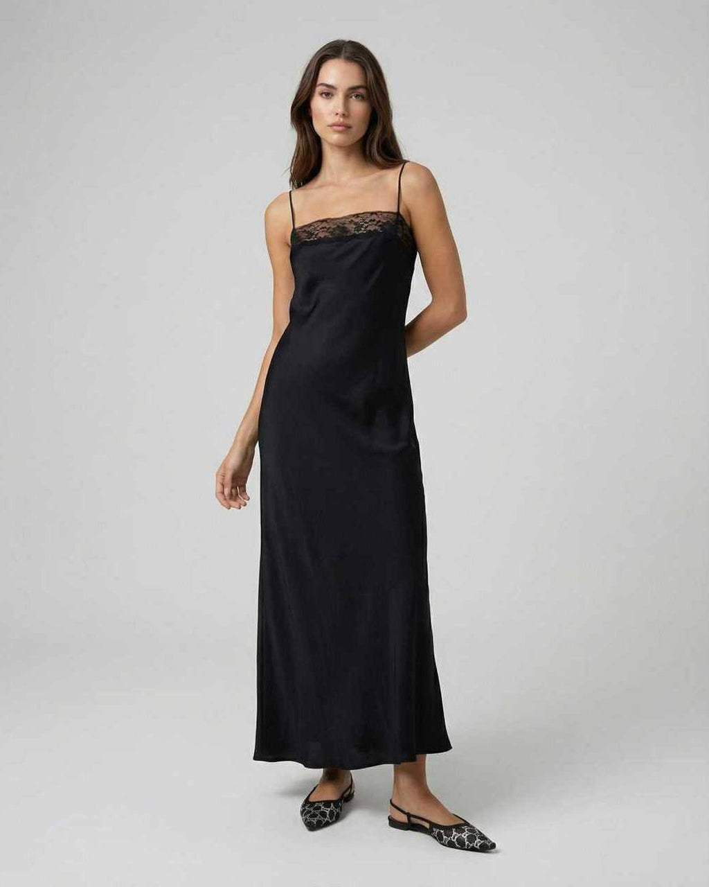 Selene Maxi Dress by Lauven featuring sleek lace-trimmed spaghetti straps in elegant black fabric.