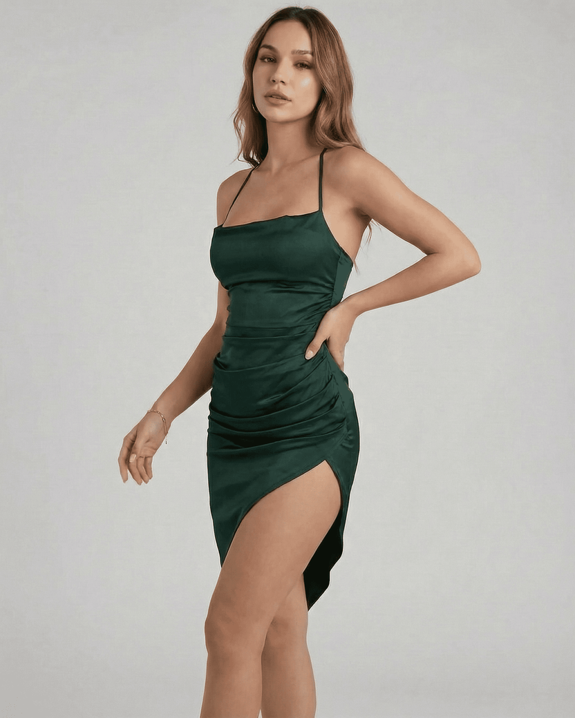 Selene Midi Dress by Lauven, featuring a sleek satin silhouette and elegant pleating in a rich green color.