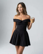 Selene Mini Dress by Lauven, featuring a sleek slim fit, spaghetti straps, and a flattering off-shoulder design.