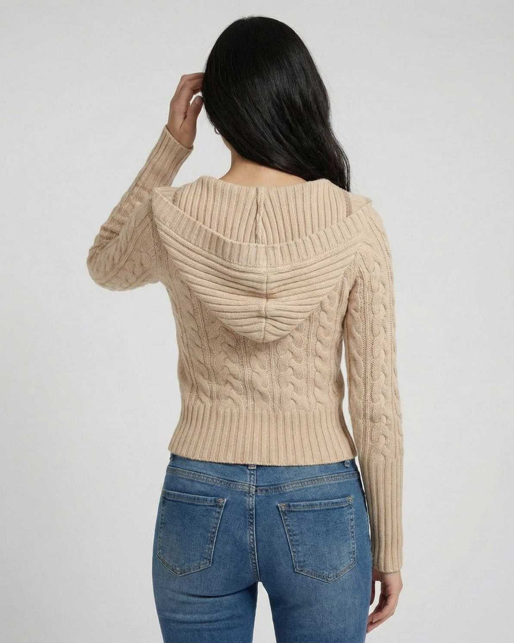 Back view of Siena Sweater by Lauven, showcasing hooded cable knit design and structured slim fit.