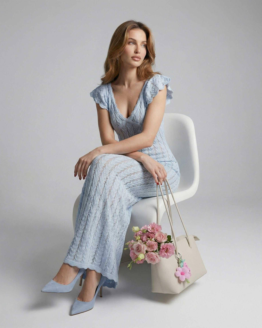 Sienna Maxi Dress by Lauven, featuring a light blue lace design, V-neck and ruffle sleeves, perfect for elegant occasions.