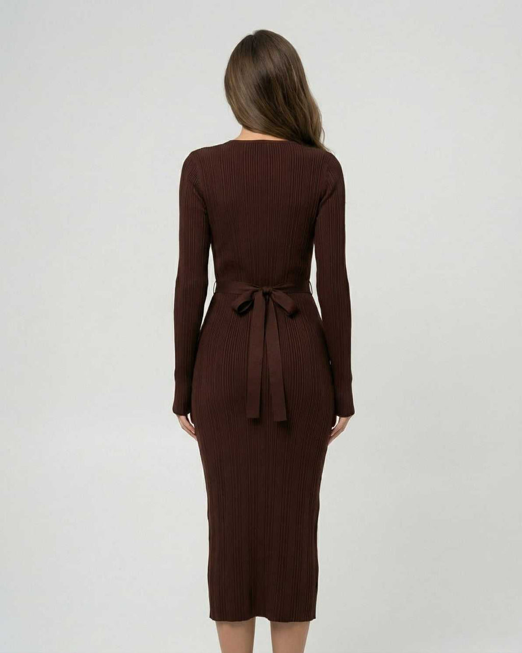 Sienna Midi Dress by Lauven, showcasing the back view of a ribbed long sleeve bodycon design.