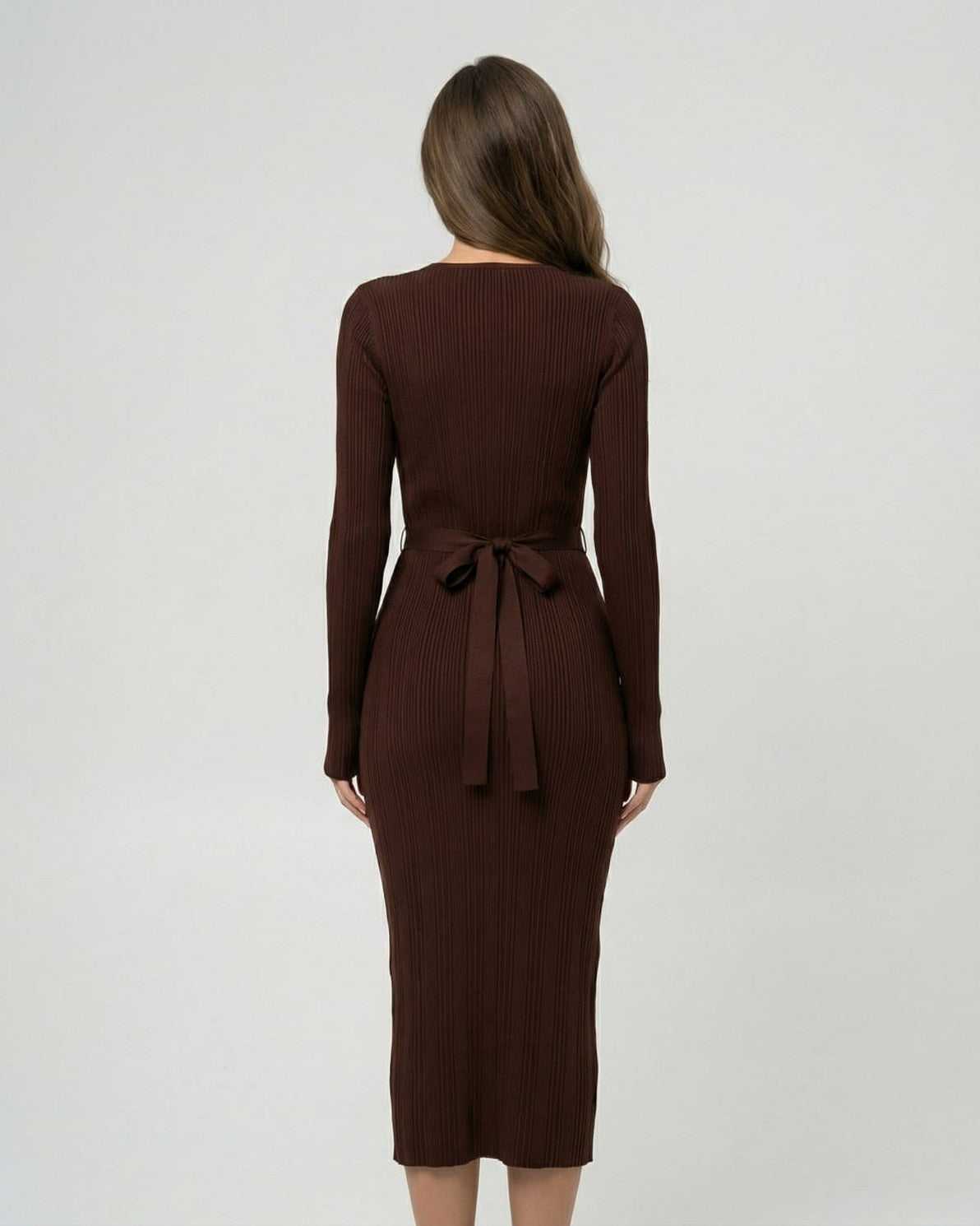 Sienna Midi Dress by Lauven, showcasing the back view of a ribbed long sleeve bodycon design.