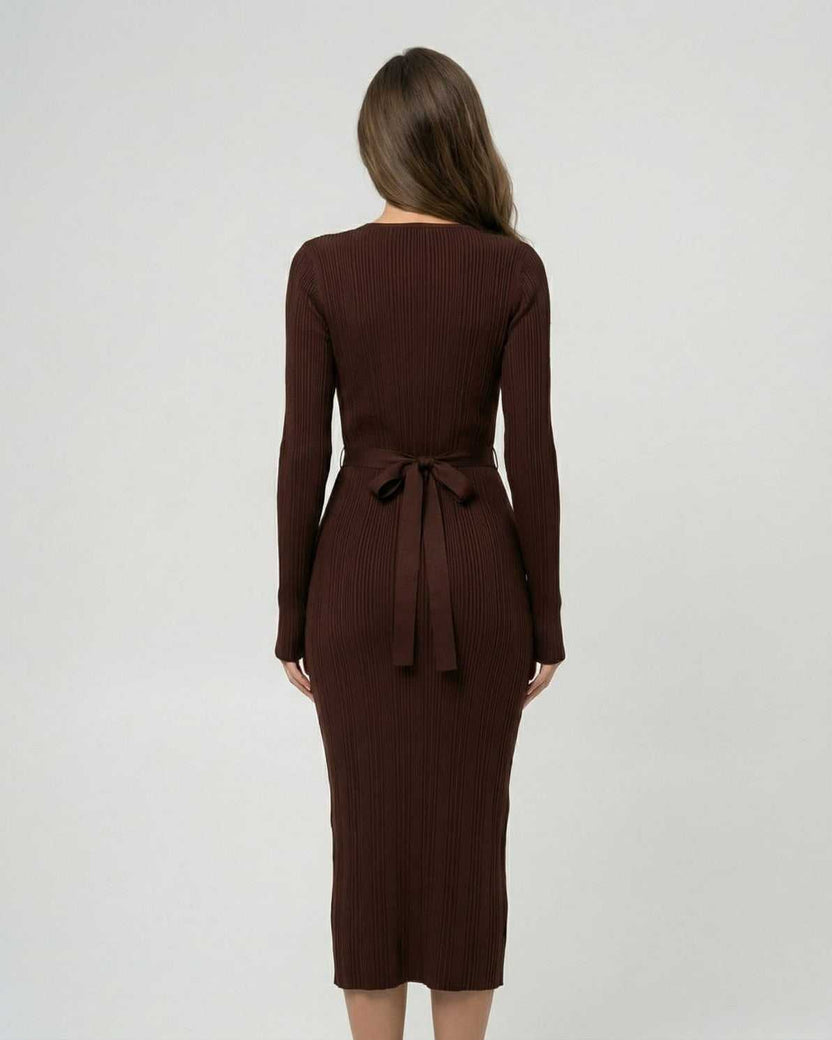 Sienna Midi Dress by Lauven, showcasing the back view of a ribbed long sleeve bodycon design.