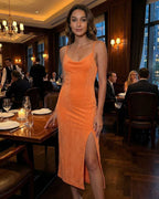 Solara Midi Dress by Lauven, featuring a cowl neck and elegant slit, perfect for modern occasions.