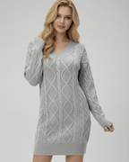 Model wearing the Lauven Sterling Mini Dress, a soft cable knit V-neck sweater dress in light gray.