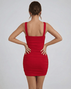Valencia Mini Dress by Lauven in red, showcasing the back view with a fitted silhouette and sleek design.