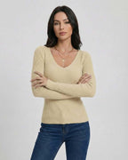 Valencia Pullover by Lauven, women’s V-neck slim fit sweater, featuring long sleeves and a fine ribbed knit texture.