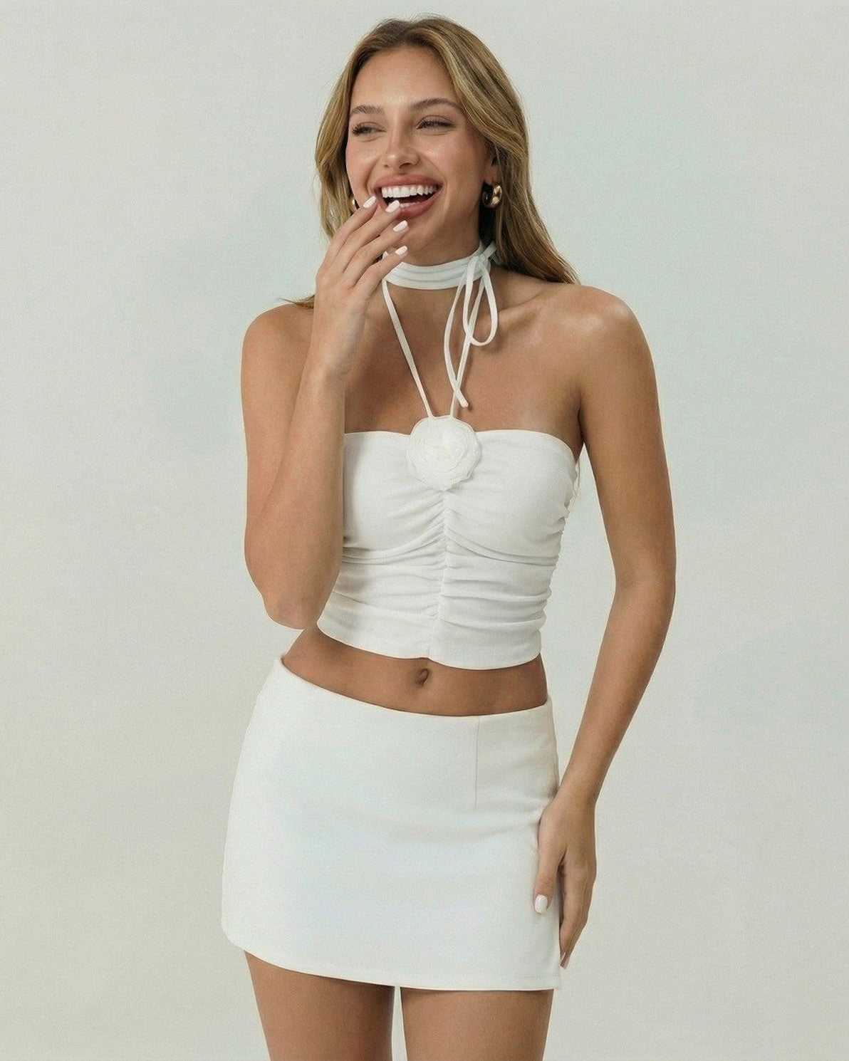 Valencia Top by Lauven, white strapless tank top with floral applique, perfect for summer style.