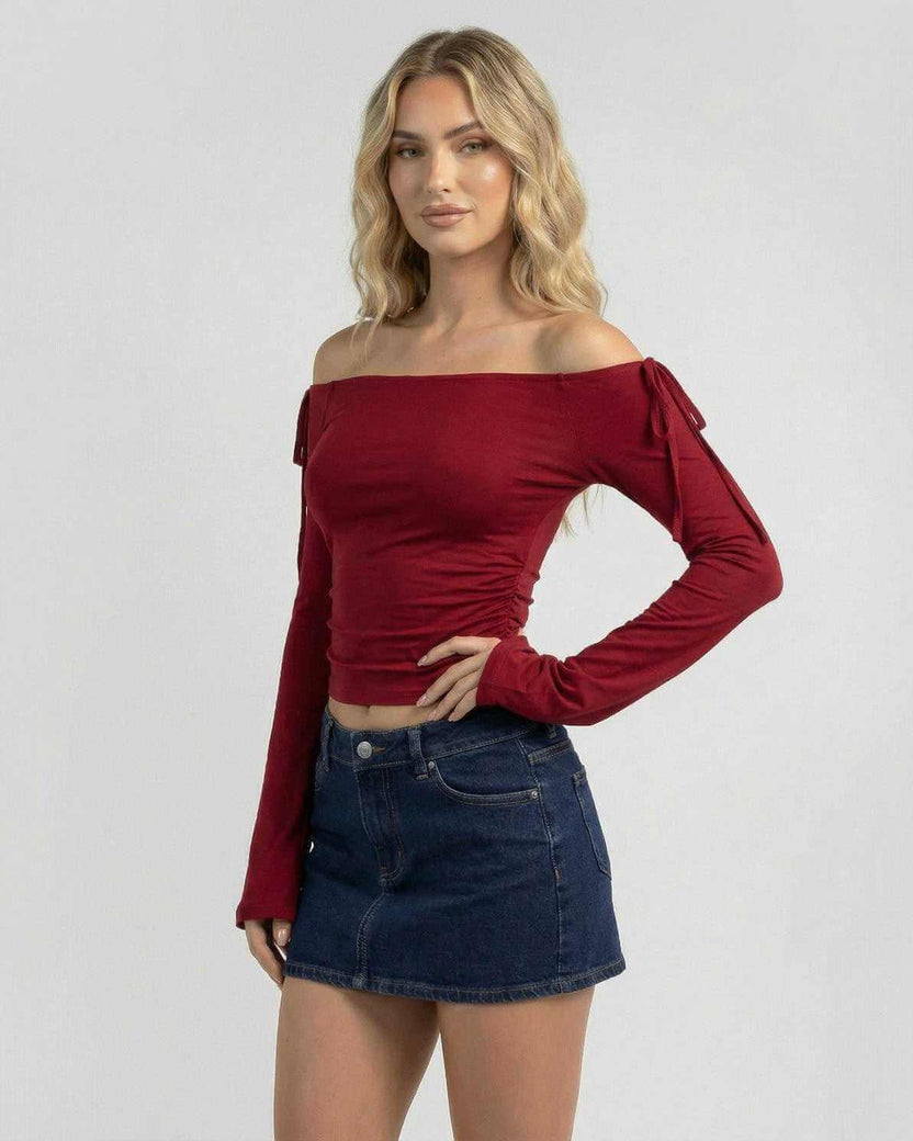 Valencia Top by Lauven: Women’s off-the-shoulder long sleeve top in deep burgundy, featuring a slim fit and stylish design.