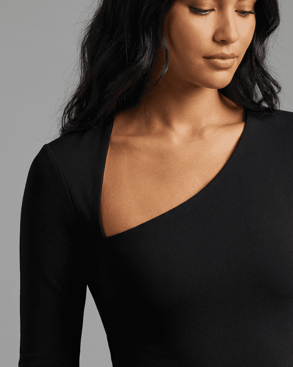Vega Midi Dress by Lauven, showcasing a stylish one-shoulder design and smooth knit fabric for a flattering fit.