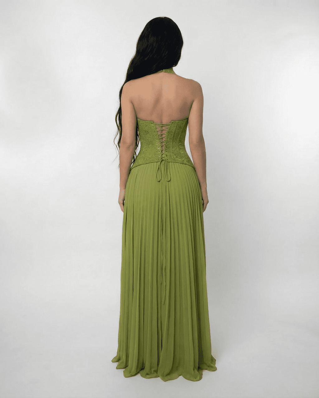 Back view of Verdant Maxi Dress by Lauven, featuring a lace bodice and flowing pleated skirt in olive green.