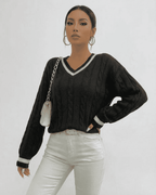 Verona Sweater by Lauven in black cable knit with V-neck and long sleeves, perfect for stylish layering.
