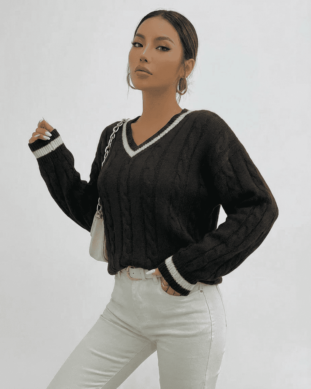 Lauven Verona Sweater - women’s cable knit V-neck pullover in black, offering classic and modern style.