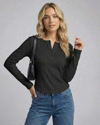 Vesper Long Sleeve by Lauven, women's long sleeve Henley top in black with a button placket and slim fit.