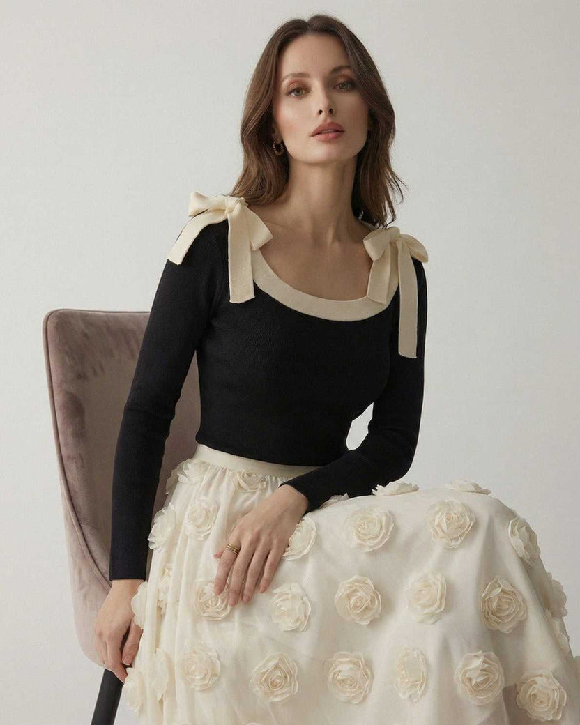Camellia Pullover by Lauven – Women's elegant black knit pullover sweater with bow detail and contrast neckline.