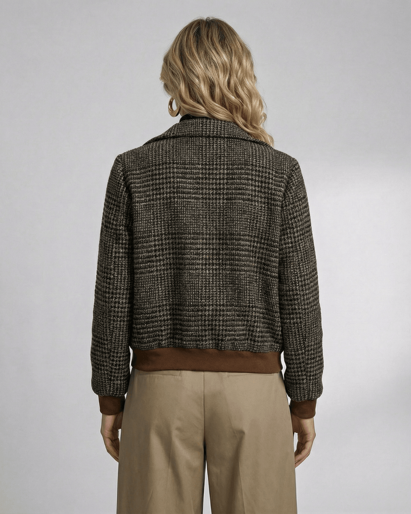 Back view of a woman in a Lauven Cambridge Jacket featuring a plaid design and stylish lapel collar.