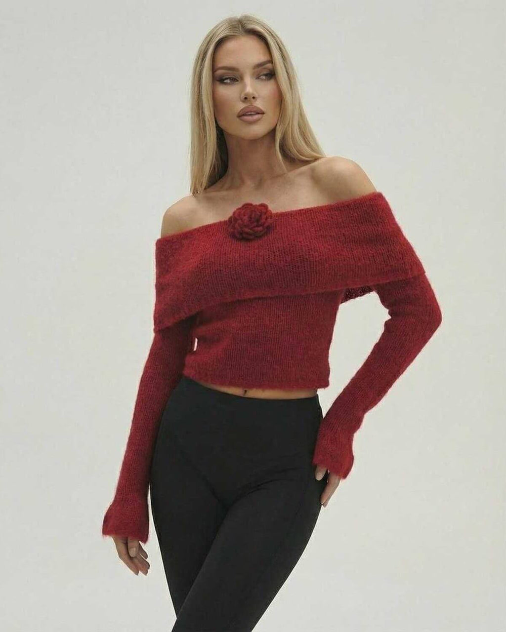 Verona Pullover by Lauven – Women’s off the shoulder red sweater with long sleeve flare details.
