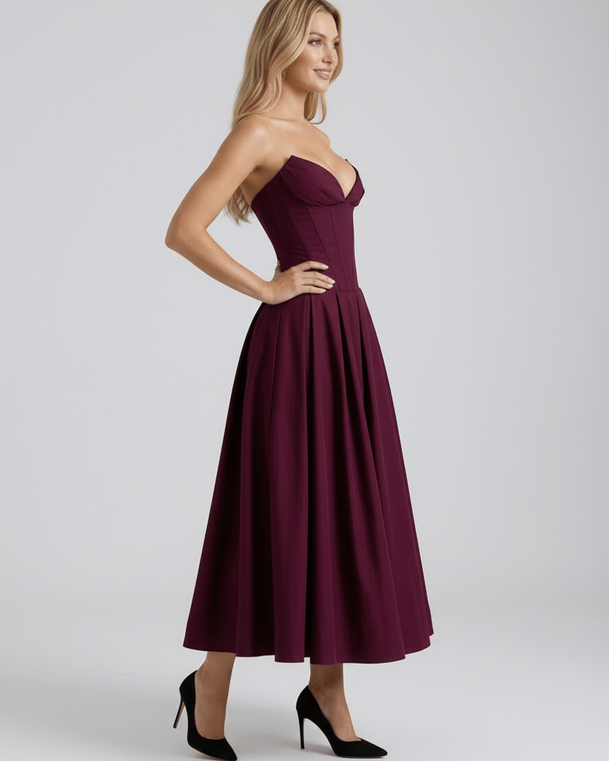 Aveline Midi Dress featuring a V-neck design, flowing skirt, and elegant silhouette by Lauven.