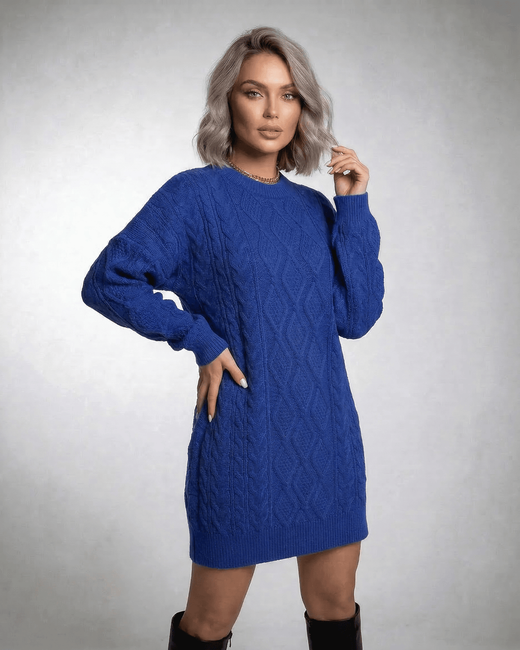Royal Mini Dress by Lauven in deep blue cable knit, showcasing a relaxed fit and modern style.