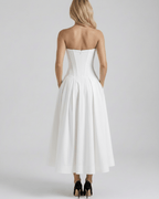 Aveline Midi Dress in white with V-neck, structured fit, elegant silhouette by Lauven. Perfect for any occasion.