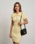 Lemon Knit Dress by Lauven – Elegant ribbed yellow mini dress with collar and ruffled design, perfect for everyday style.