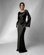 Liora Maxi Dress by Lauven, elegant black satin gown with flowing silhouette and stylish bell sleeves.