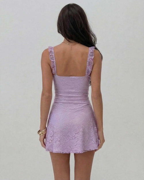 Lauven Lilac Mini Dress showcasing elegant lace detail from the back on a model.