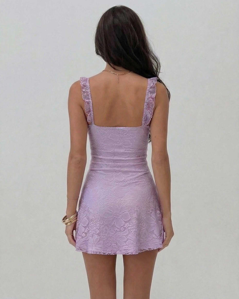 Lauven Lilac Mini Dress showcasing elegant lace detail from the back on a model.