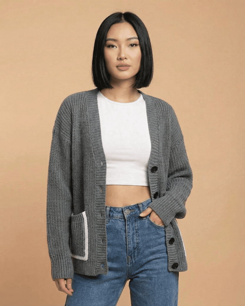 Linden Cardigan by Lauven displayed on a model, showcasing a relaxed V-neck and color block knit design.