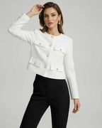 Liora Jacket by Lauven, elegant white jacket with gold button accents and tailored fit.