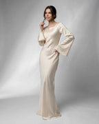 Elegant Liora Maxi Dress from Lauven, featuring flowing silhouette and stunning bell sleeves in luxurious satin.