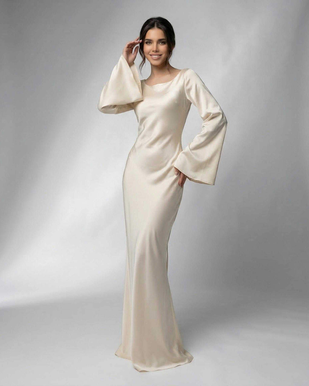 Liora Maxi Dress by Lauven featuring elegant bell sleeves and luxurious satin fabric in a refined cream tone.