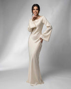 Liora Maxi Dress by Lauven featuring flowing silhouette and elegant bell sleeves in luxurious satin fabric.