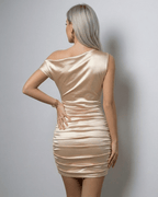 Lumière Mini Dress – Champagne satin one shoulder mini dress with ruched detail by Lauven.