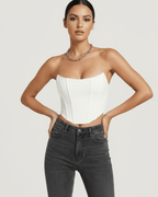 Luna Corset Top by Lauven, elegant white velvet structured design, showcasing vertical boning and a sculptural silhouette.