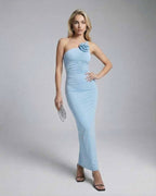 Luna Maxi Dress by Lauven, elegant asymmetrical blue evening gown showcasing floral appliqué detail.