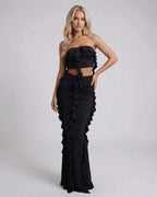 Luna Maxi Dress by Lauven, elegant black sheath silhouette with ruffle detail, sleeveless design.