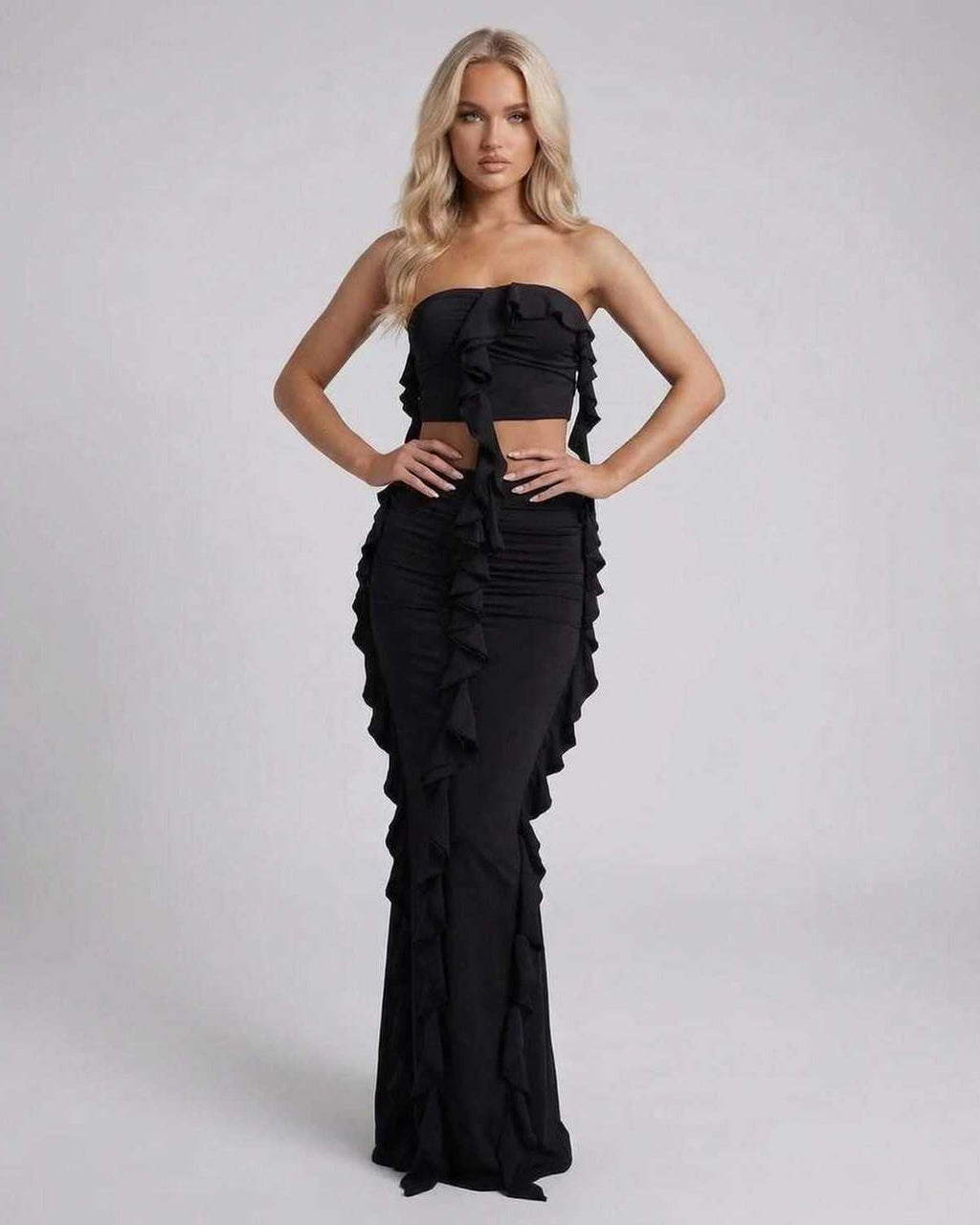 Luna Maxi Dress by Lauven in elegant black with ruffle details, showcasing a flattering sheath silhouette.