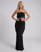 Luna Maxi Dress by Lauven in elegant black with ruffle details, showcasing a flattering sheath silhouette.