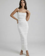 Luna Maxi Dress by Lauven - Sleek sheath silhouette in crisp white with ruffles and spaghetti straps.
