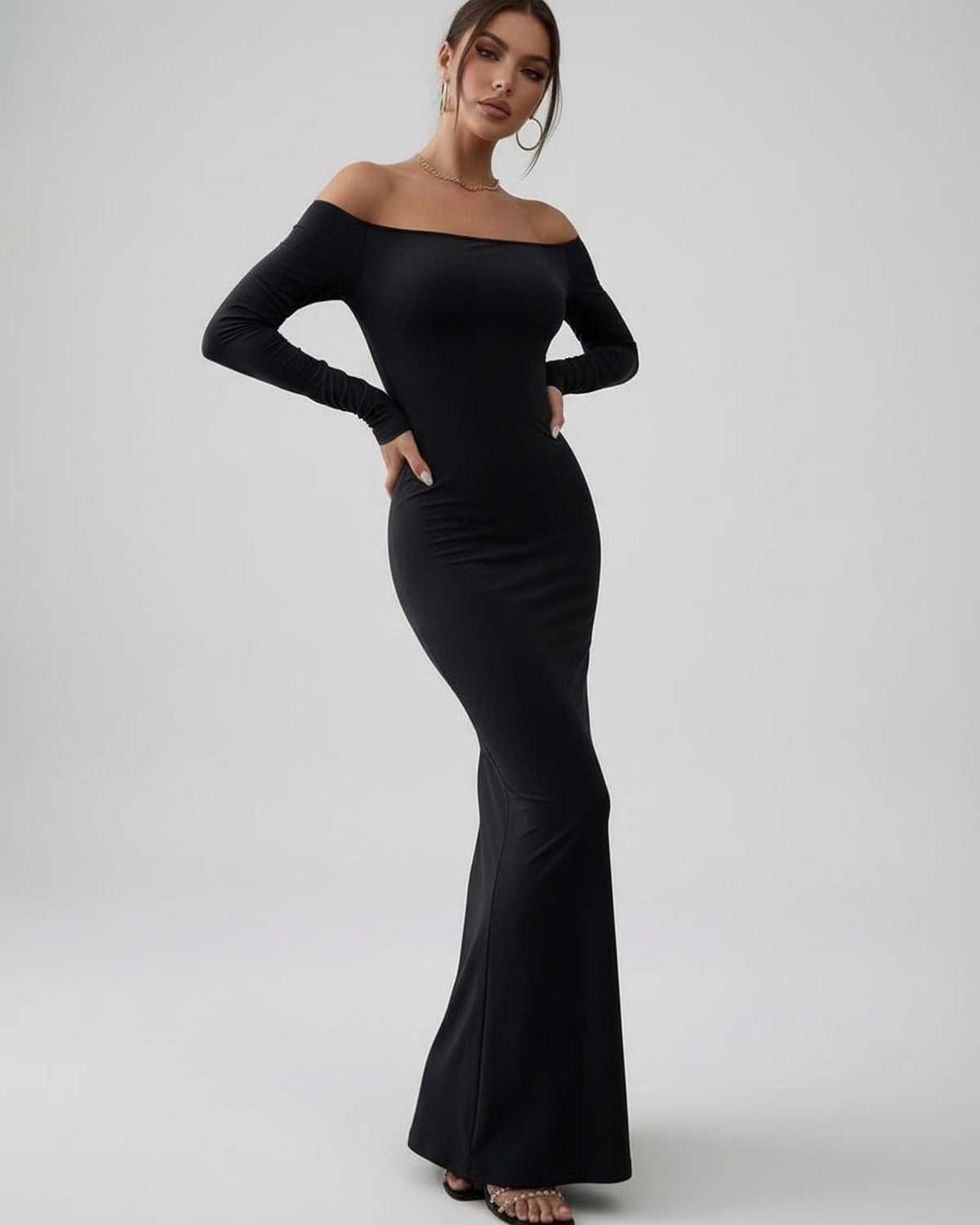 Lauven Luna Maxi Dress in classic black, sleek off-shoulder long sleeve, perfect for a sophisticated silhouette.