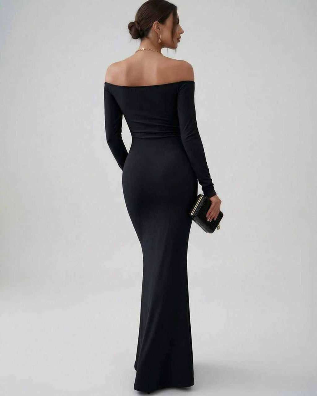 Lauven Luna Maxi Dress in sleek off-shoulder style, featuring long sleeves and luxurious black stretch fabric.