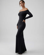 Lauven Luna Maxi Dress featuring sleek off-shoulder long sleeves in classic black, showcasing a sophisticated silhouette.