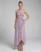 Luna Maxi Dress by Lauven in soft lavender with pleated halter neck and ruffle details, showcasing a graceful silhouette.