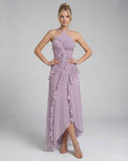 Luna Maxi Dress by Lauven in soft lavender, featuring pleated chiffon and ruffles for an elegant look.