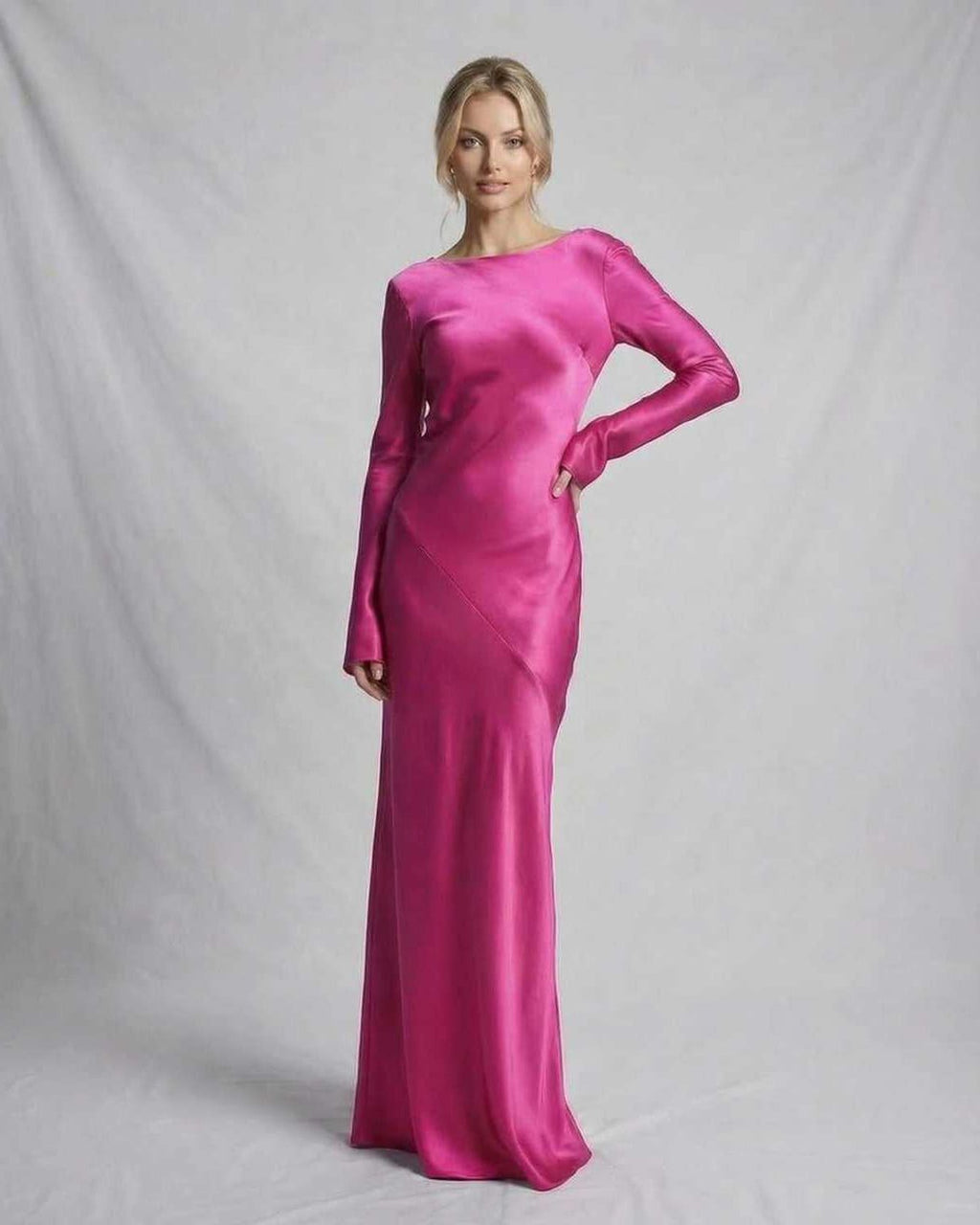 Luna Maxi Dress by Lauven in vibrant pink satin, showcasing a graceful silhouette and modern design.