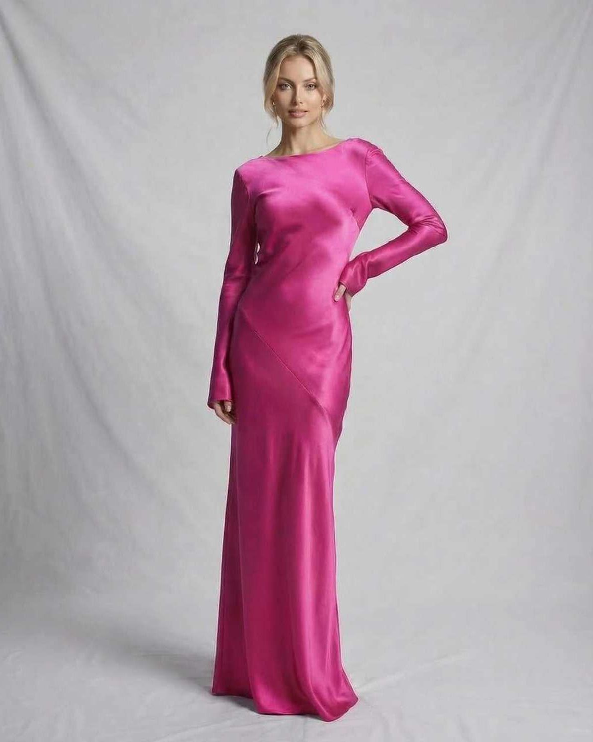 Luna Maxi Dress by Lauven in vibrant pink satin, showcasing a graceful silhouette and modern design.