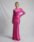 Vibrant pink Luna Maxi Dress by Lauven, showcasing a sleek satin design and a modern silhouette, ideal for elegant occasions.