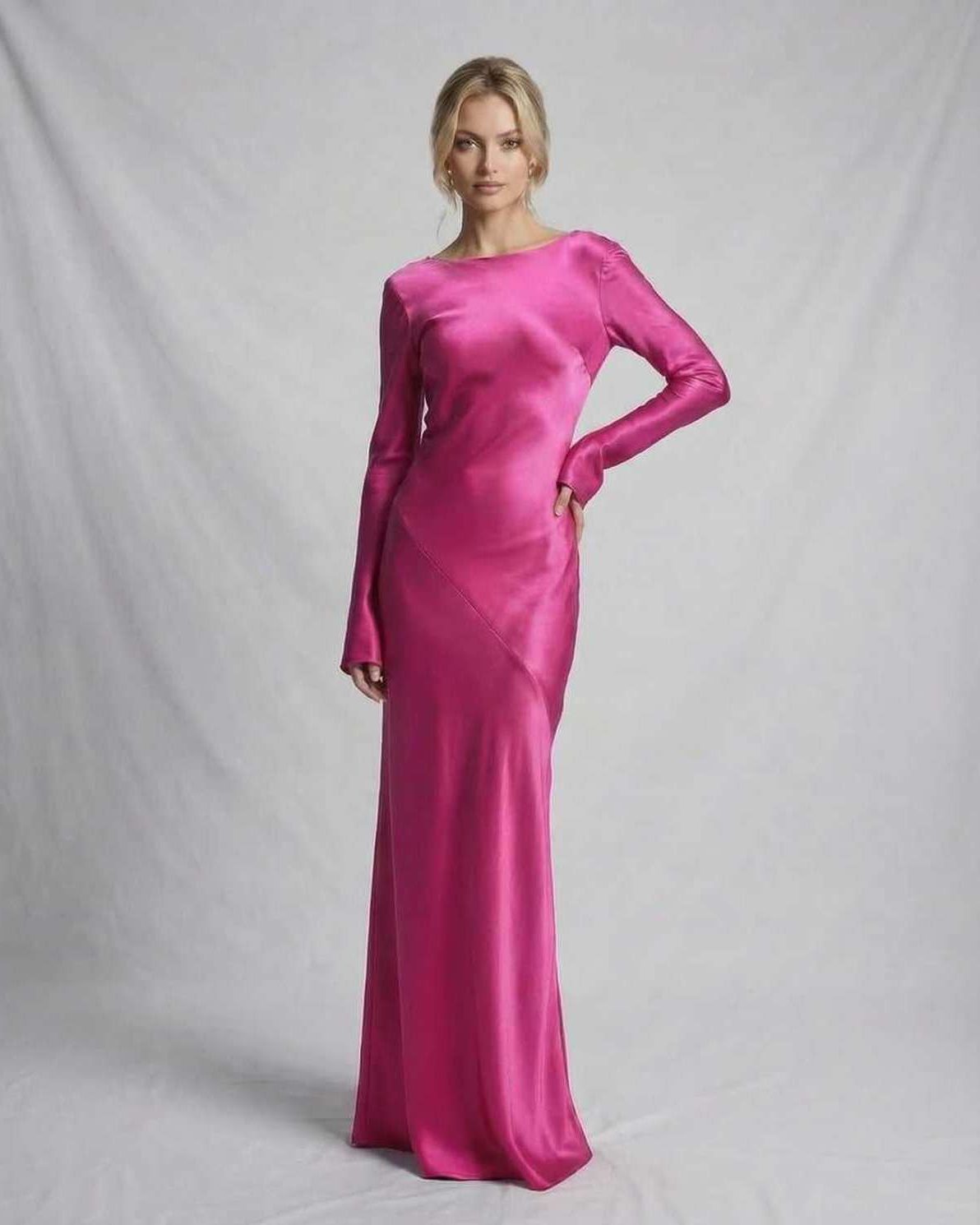Vibrant pink Luna Maxi Dress by Lauven, showcasing a sleek satin design and a modern silhouette, ideal for elegant occasions.